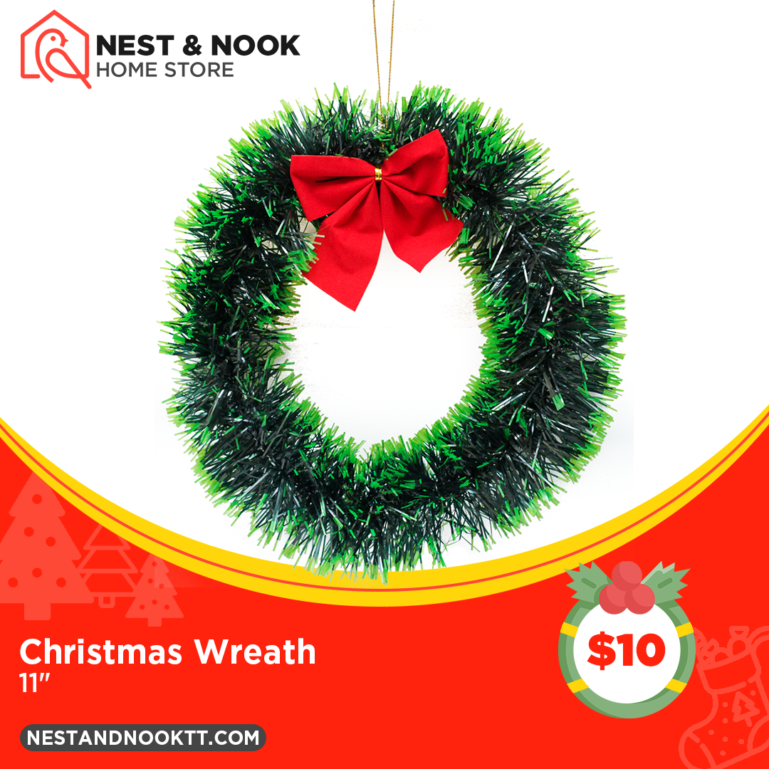 Green Christmas wreath with red bow