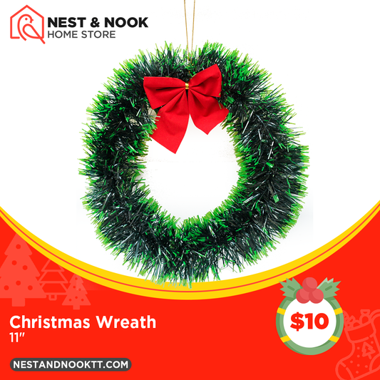 Green Christmas wreath with red bow